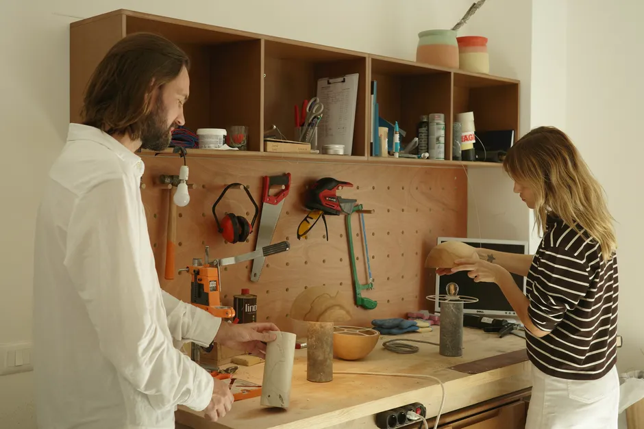 Samuela and Gust, in their office